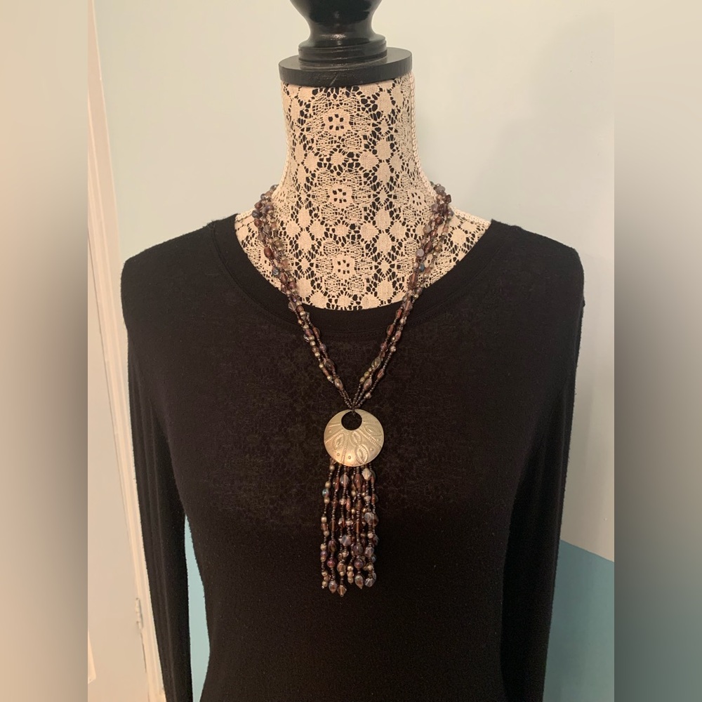 Purple beaded necklace with embossed aluminum accent